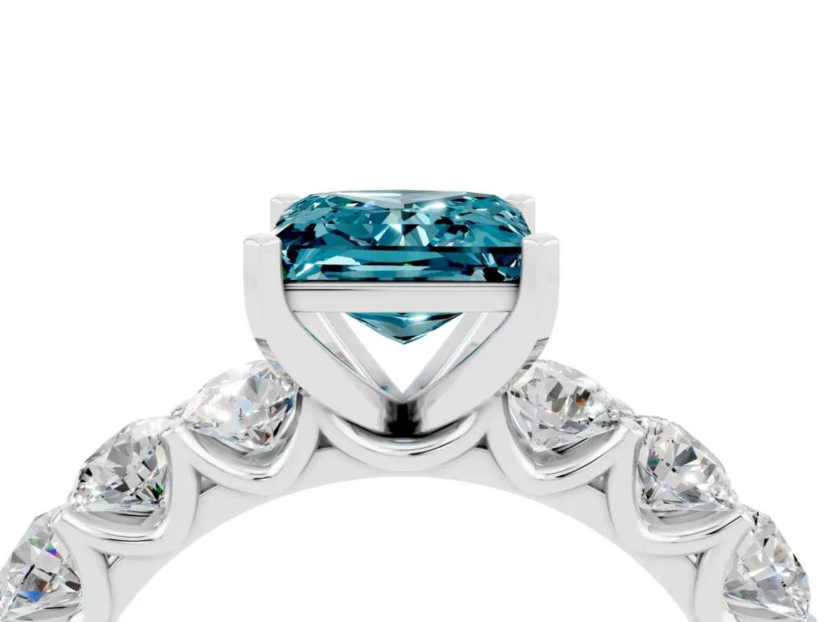 Princess Cut Blue Topaz Prong Setting with Side Stones on a Pave Band Silver