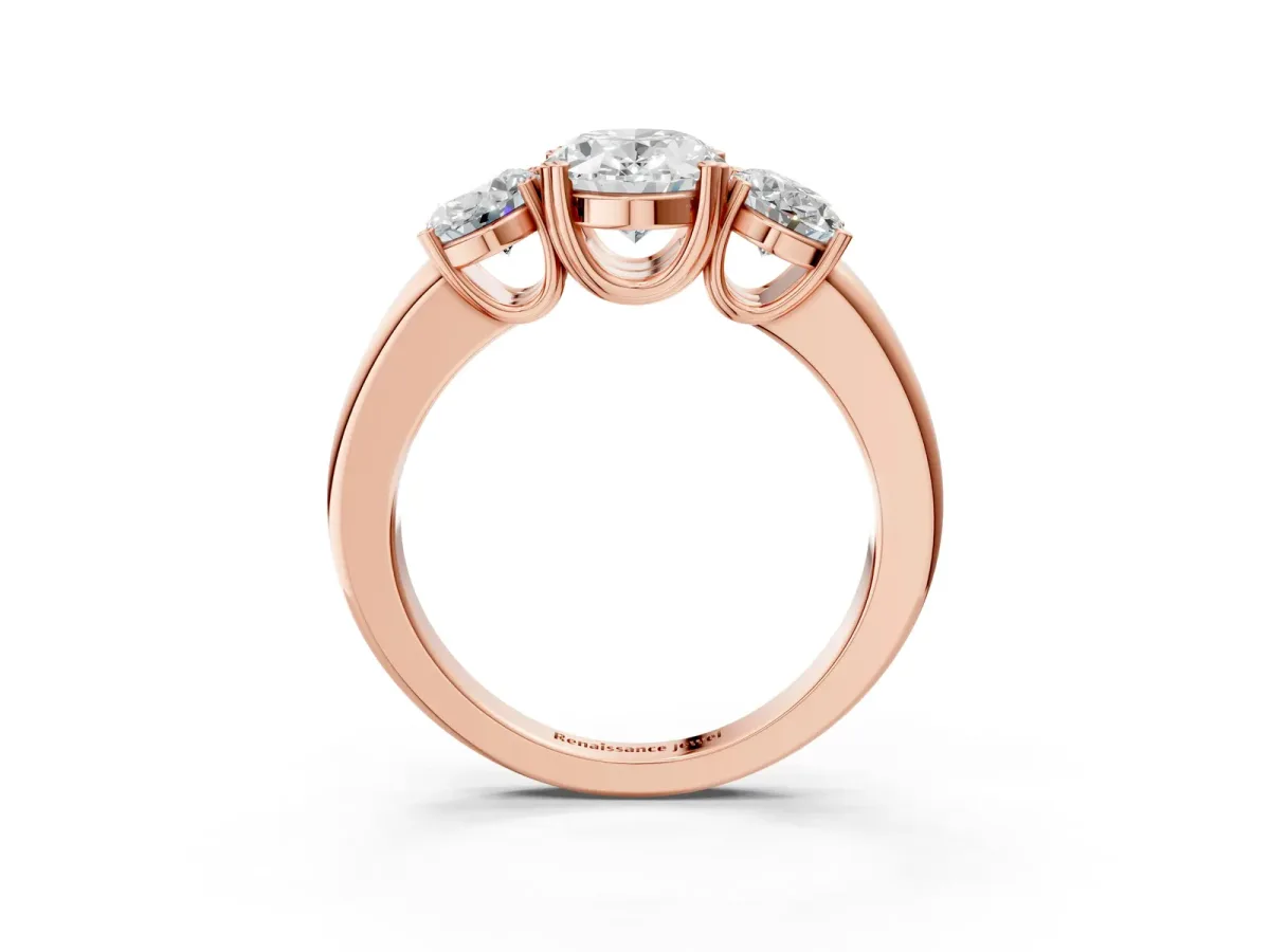Three-Stone Oval Cut Cut Diamond Ring with Channel Set Band and Four-Prong Setting Rose gold