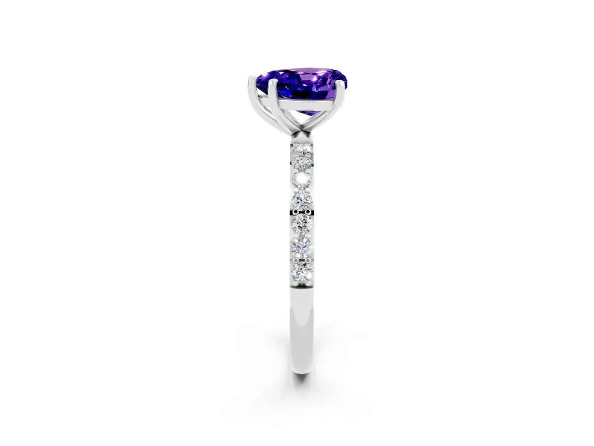 Heart Cut Tanzanite Solitaire Ring with Round Pavé Band and Prong Setting Silver