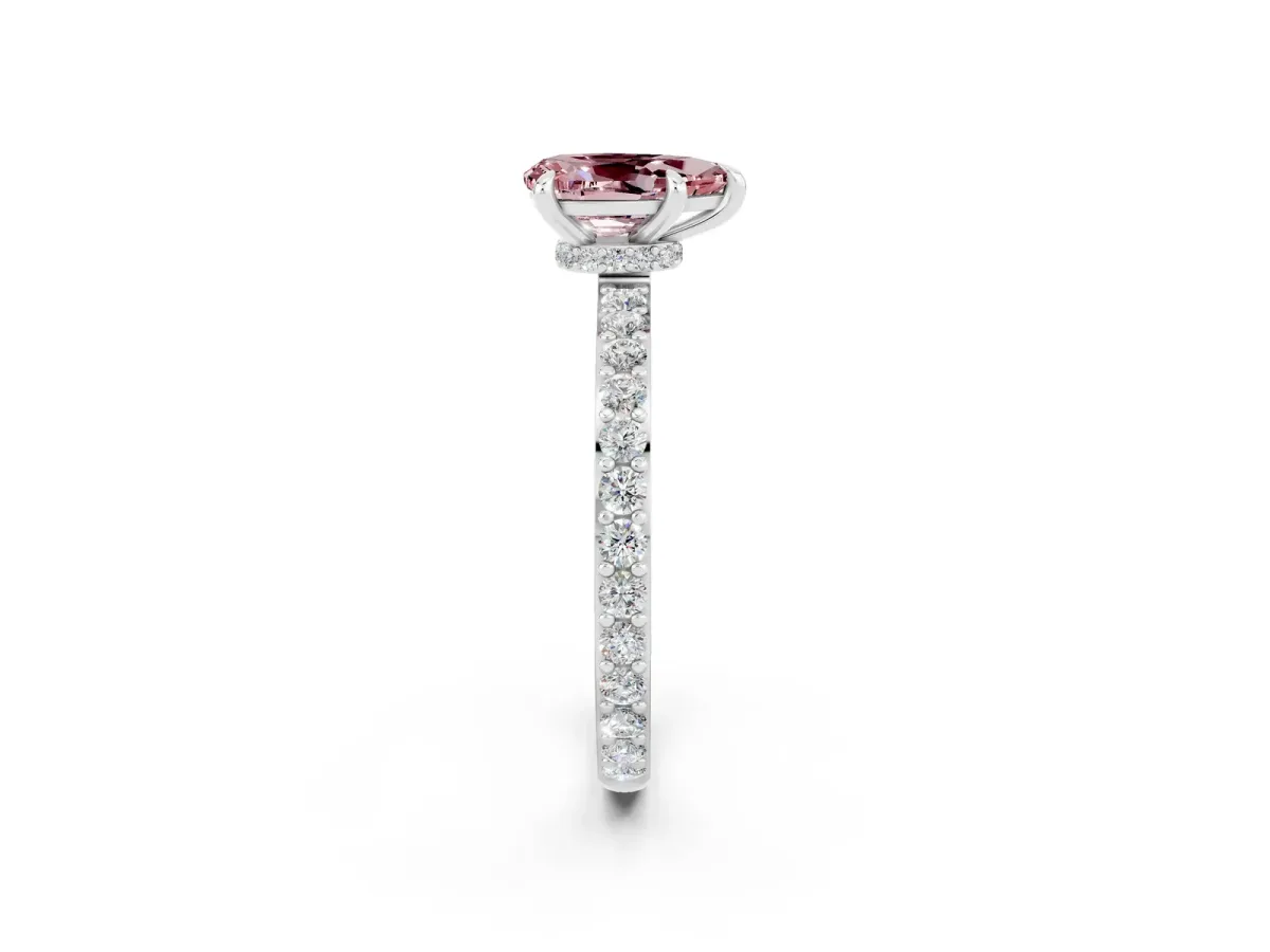 Pear Cut Morganite Solitaire Engagement Ring with Pavé Band and Four-Prong Setting Silver