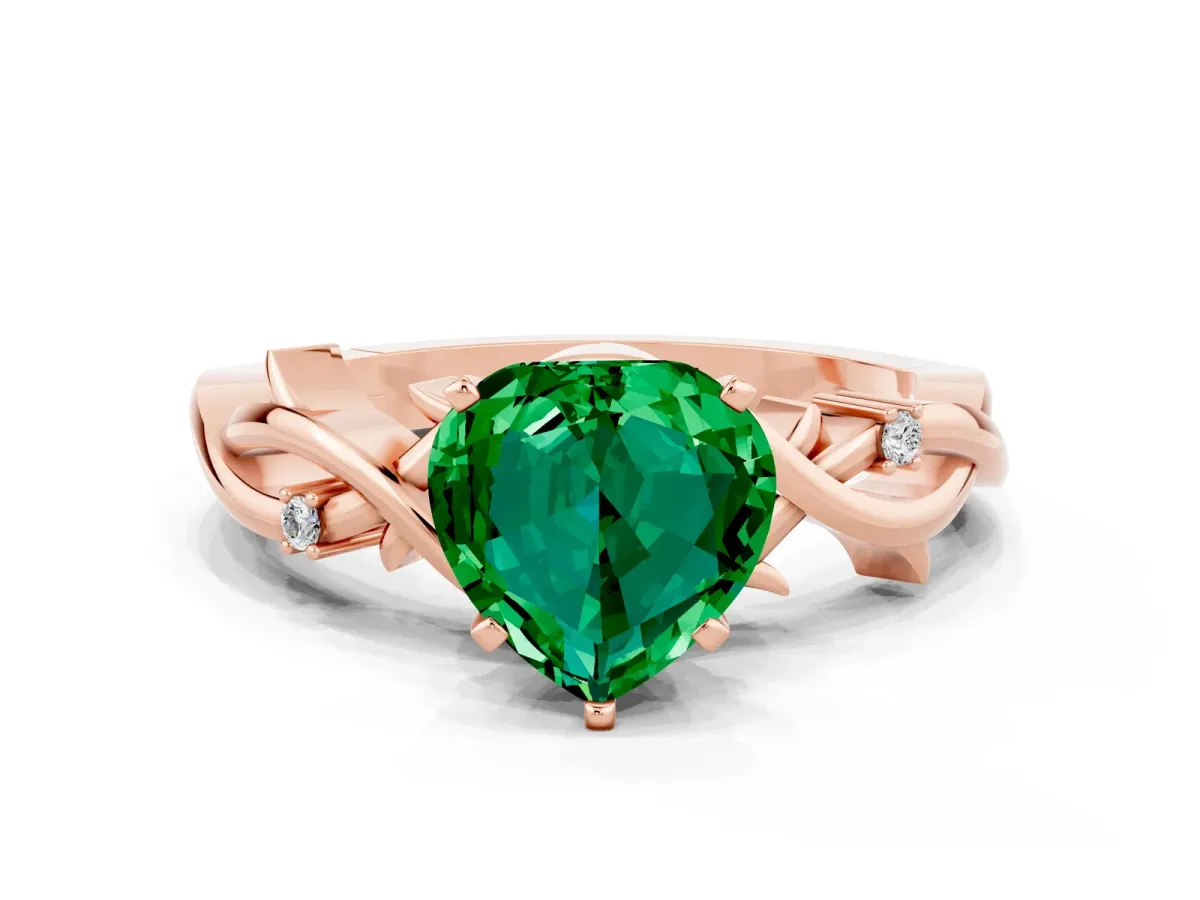 Heart Cut Emerald Solitaire Ring with Twisted Band and Prong Setting Rose gold