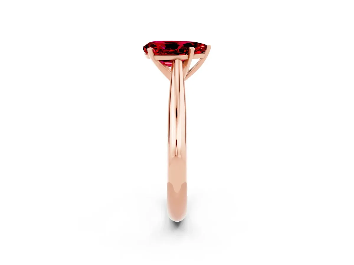 Pear Cut Ruby Solitaire Engagement Ring with Cathedral Setting and Four-Prong Mount Rose gold