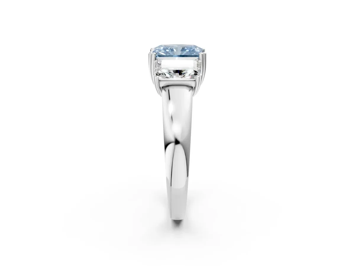 Fancy Blue Three-Stone Radiant Cut Cut Diamond Ring with Channel Set Band and Four-Prong Setting Silver
