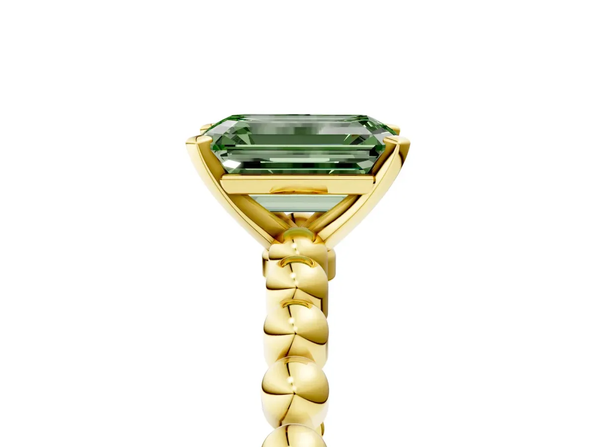 Fancy Green Emerald Cut Diamond Solitaire Ring with Beaded Band and Prong Setting Yellow gold