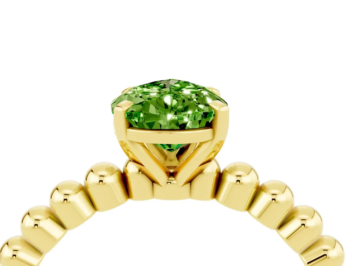 Pear Cut Peridot Solitaire Ring with Beaded Band and Prong Setting Yellow gold