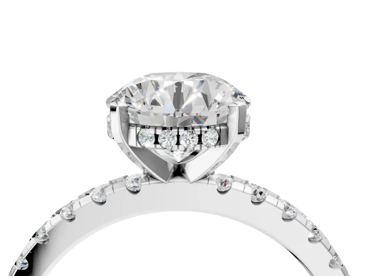 Round Cut Diamond Solitaire Ring with Round Tanzanite Pavé Band and Four-Prong Setting Silver