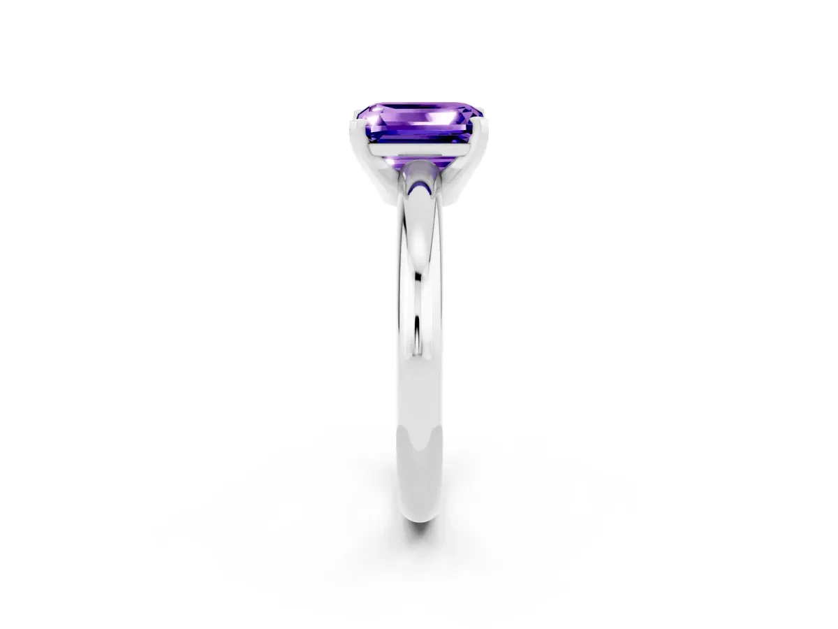Emerald Cut Tanzanite Solitaire Engagement Ring with Round Band and Four-Prong Setting Silver