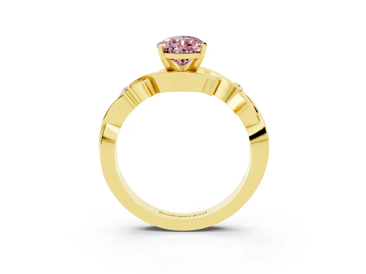 Pear Cut Morganite Solitaire Ring with Twisted Band and Prong Setting Yellow gold