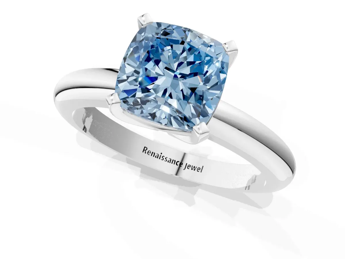 Fancy Blue Cushion Cut Diamond Solitaire Engagement Ring with Round Band and Four-Prong Setting Silver