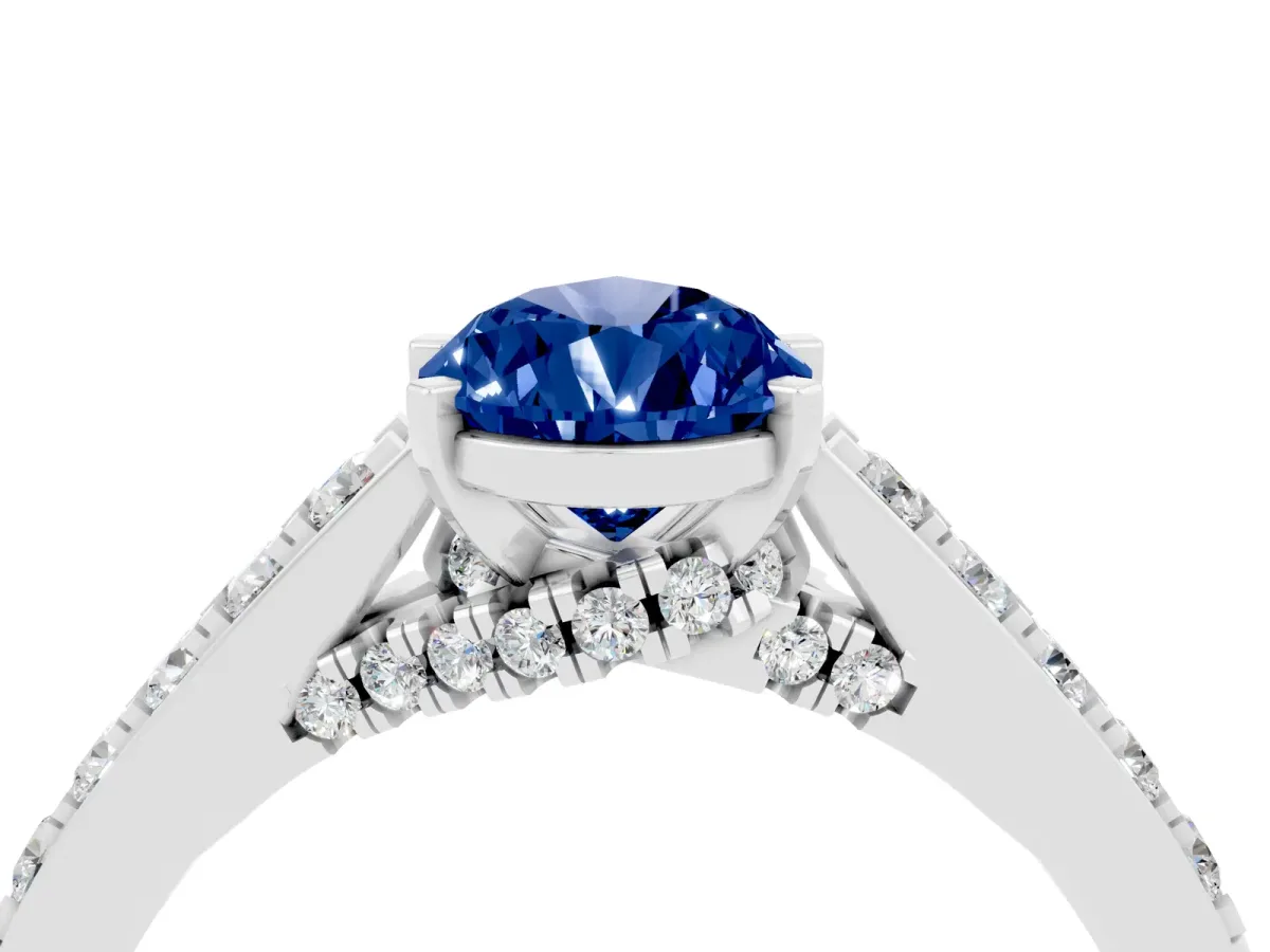 Pear Cut Blue Sapphire Solitaire Ring with Crossover Gallery and Round Pavé Band Silver