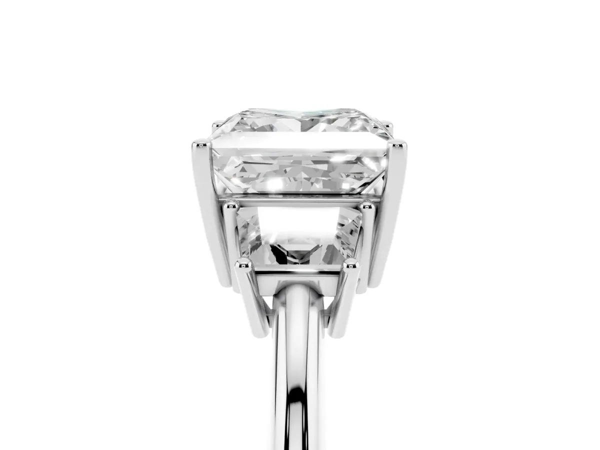 Princess Cut Diamond Three-Stone Ring with Trapezoid Side Stones and Prong Setting Platinum