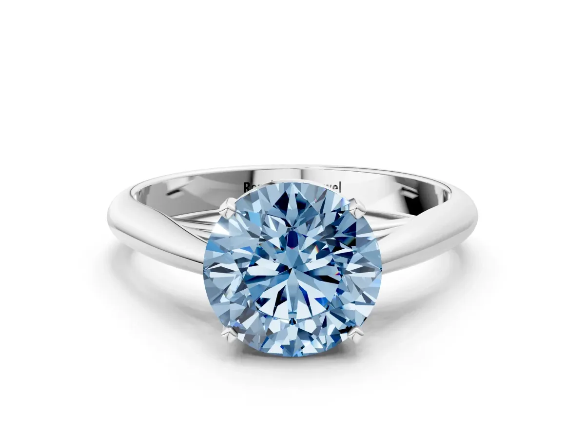 Fancy Blue Round Cut Diamond Solitaire Engagement Ring with Cathedral Setting and Four-Prong Mount White gold