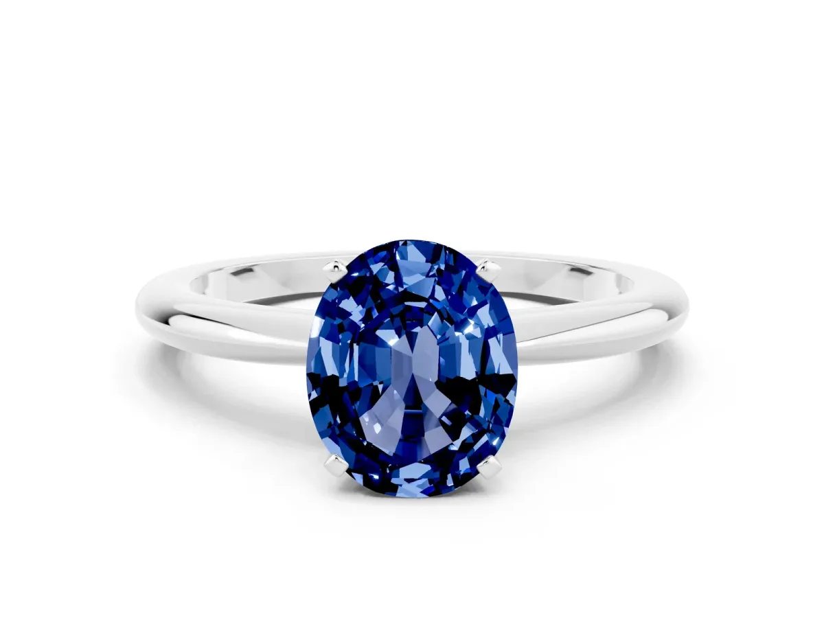 Oval Cut Blue Sapphire Solitaire Ring with Six-Prong Setting and Classic Band Silver