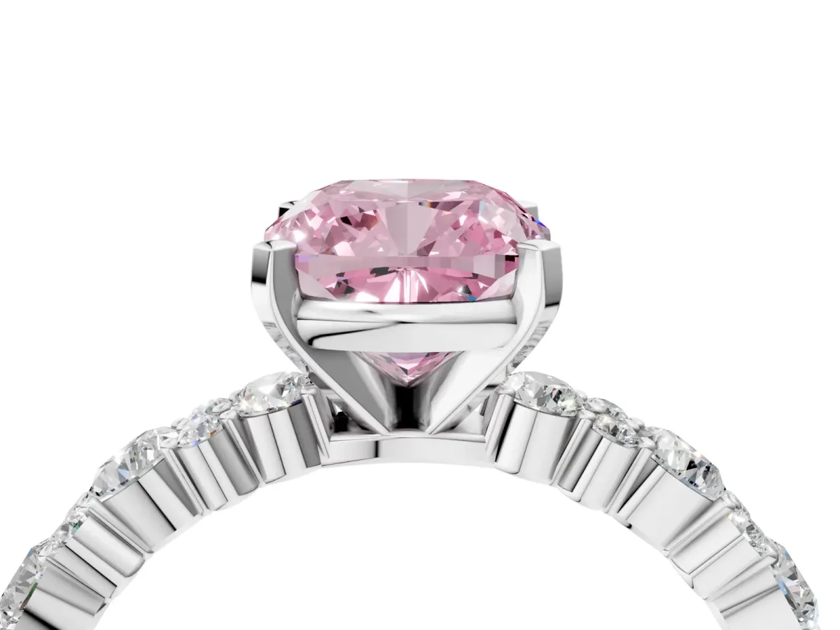 Fancy Pink Cushion Cut Diamond Side Stone Solitaire Ring with Round and Four-Prong Setting Platinum
