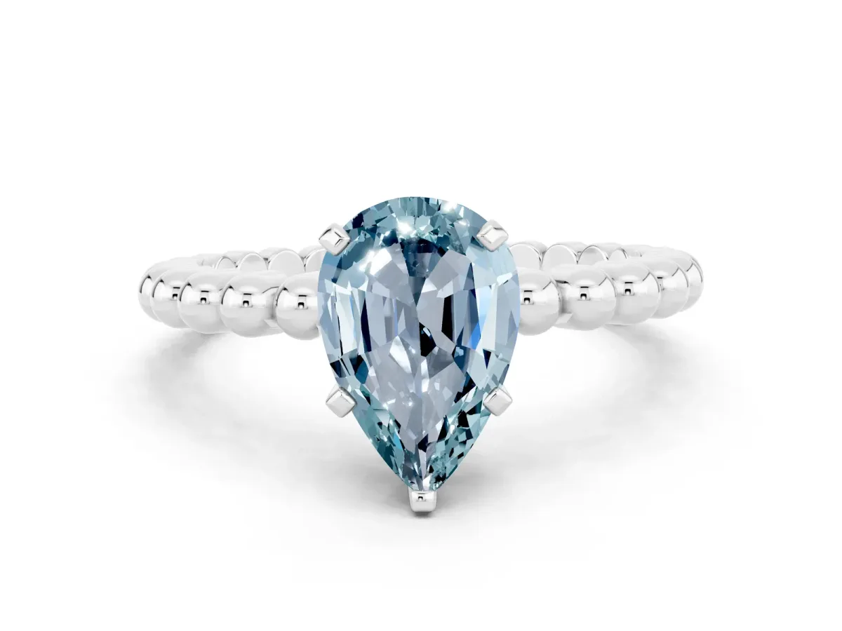 Pear Cut Aquamarine Solitaire Ring with Beaded Band and Prong Setting Silver