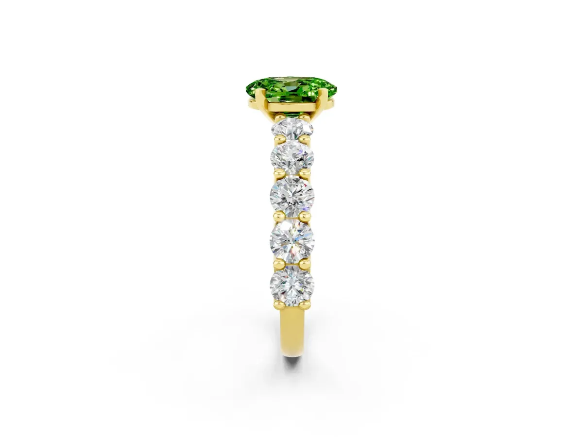 Oval Cut Peridot Prong Setting with Side Stones on a Pave Band Yellow gold