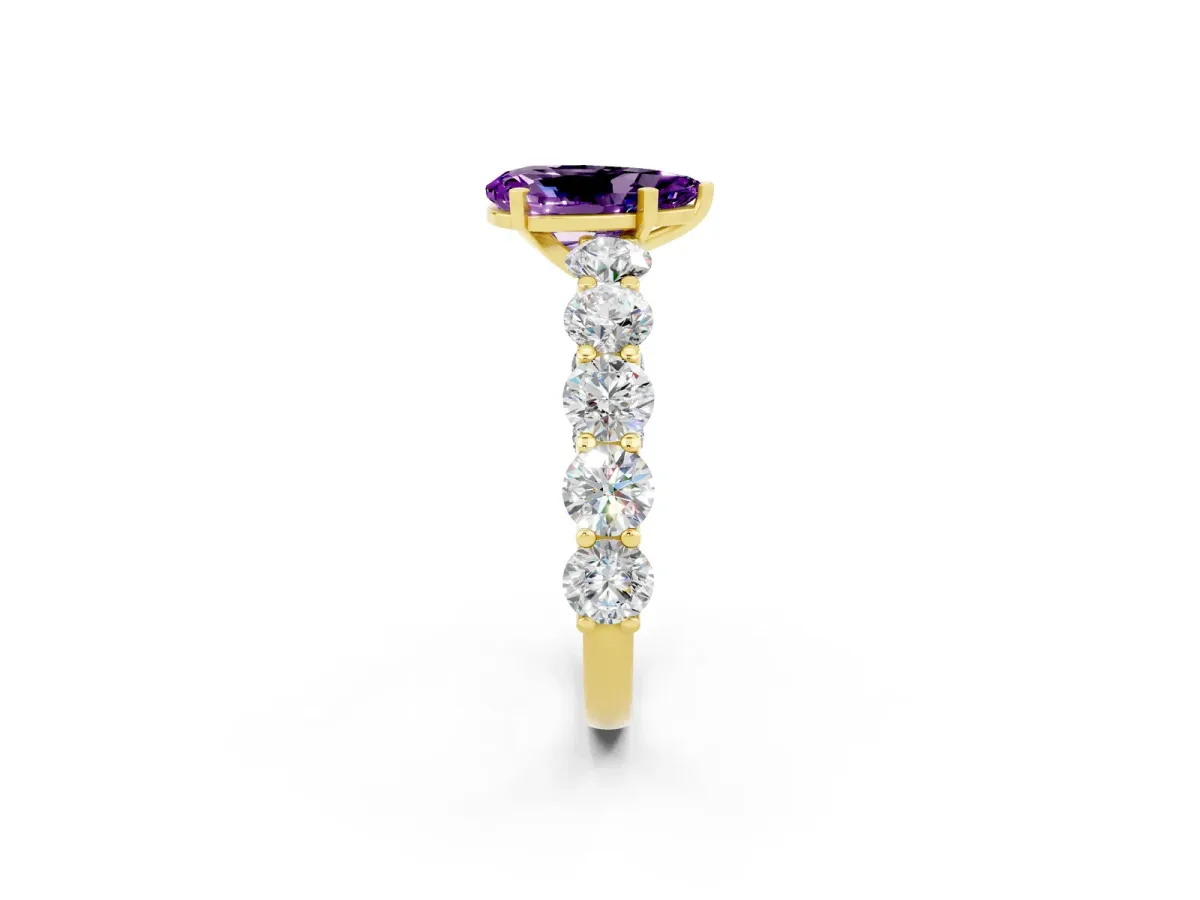Pear Cut Amethyst Prong Setting with Side Stones on a Pave Band Yellow gold
