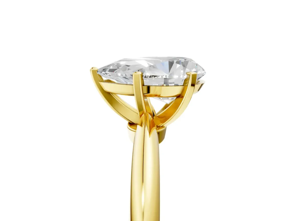 Pear Cut Diamond Solitaire Ring with Six-Prong Setting and Classic Band Yellow gold