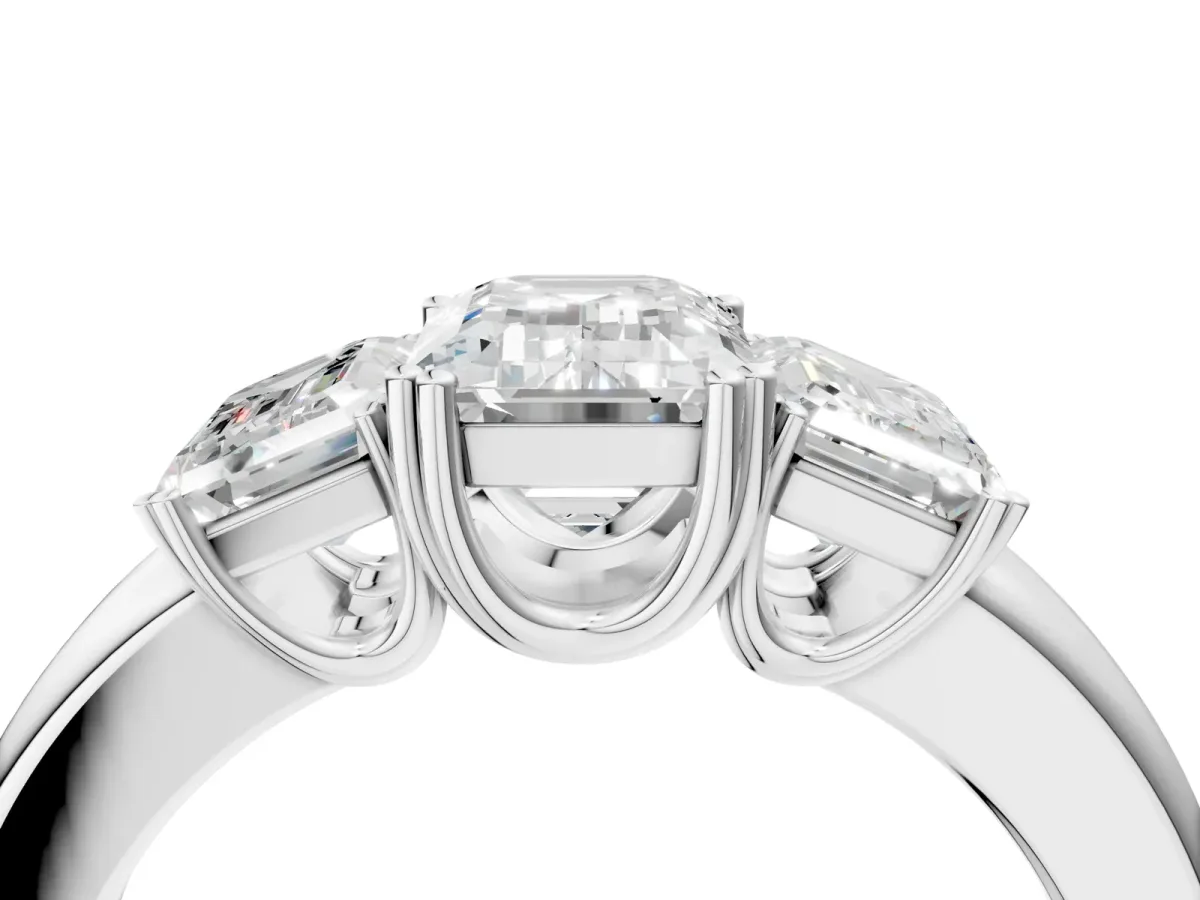 Three-Stone Emerald Cut Cut Diamond Ring with Channel Set Band and Four-Prong Setting White gold