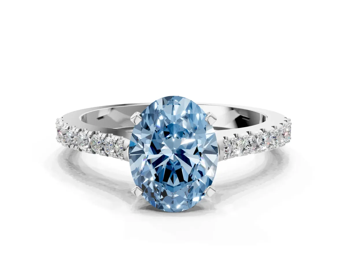 Fancy Blue Oval Cut Cut Solitaire Diamond Engagement Ring with Pave Band and Four-Prong Setting Silver