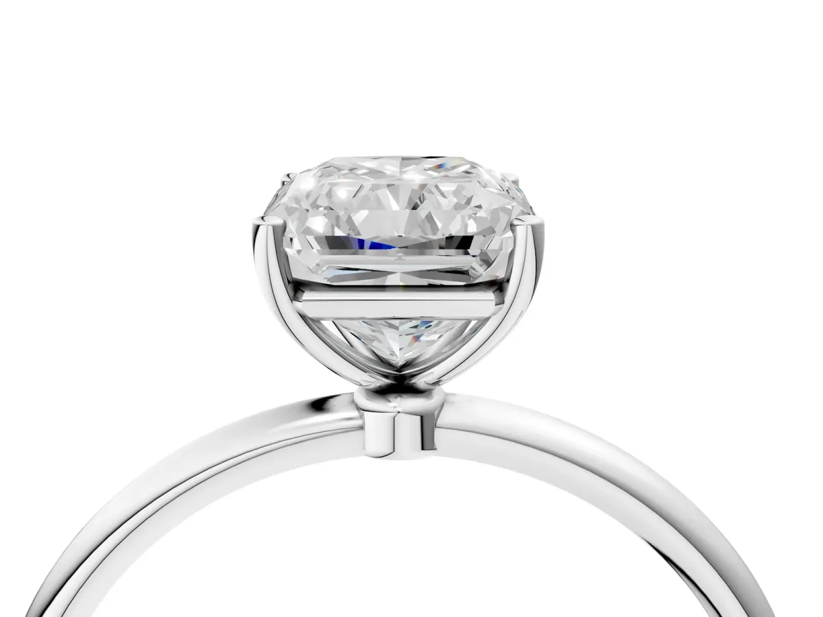 Radiant Cut Cut Solitaire Engagement Ring with Thin Band and Four-Prong Setting Platinum