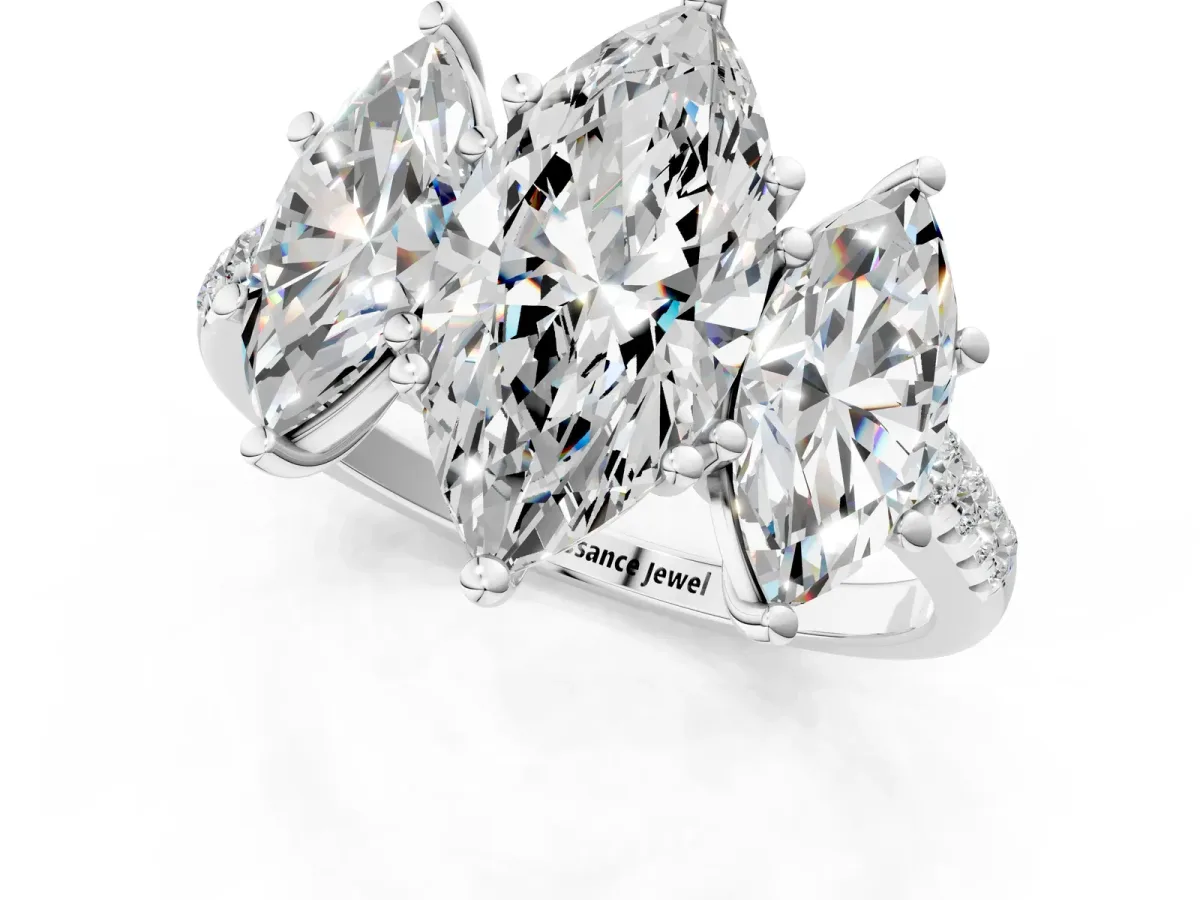 Three-Stone Marquise Cut Diamond Ring with Round Pavé Band and Prong Setting Platinum