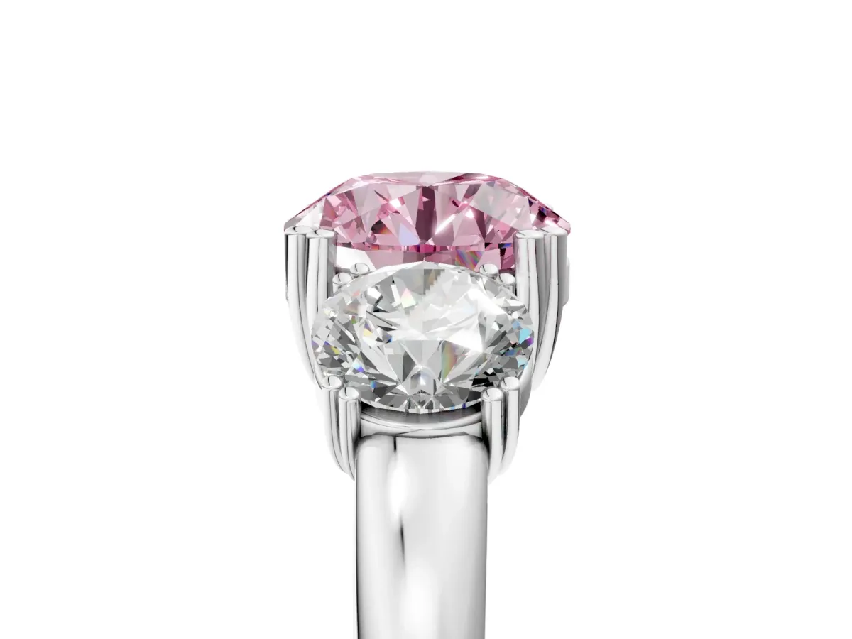 Fancy Pink Three-Stone Round Cut Cut Diamond Ring with Channel Set Band and Four-Prong Setting Silver