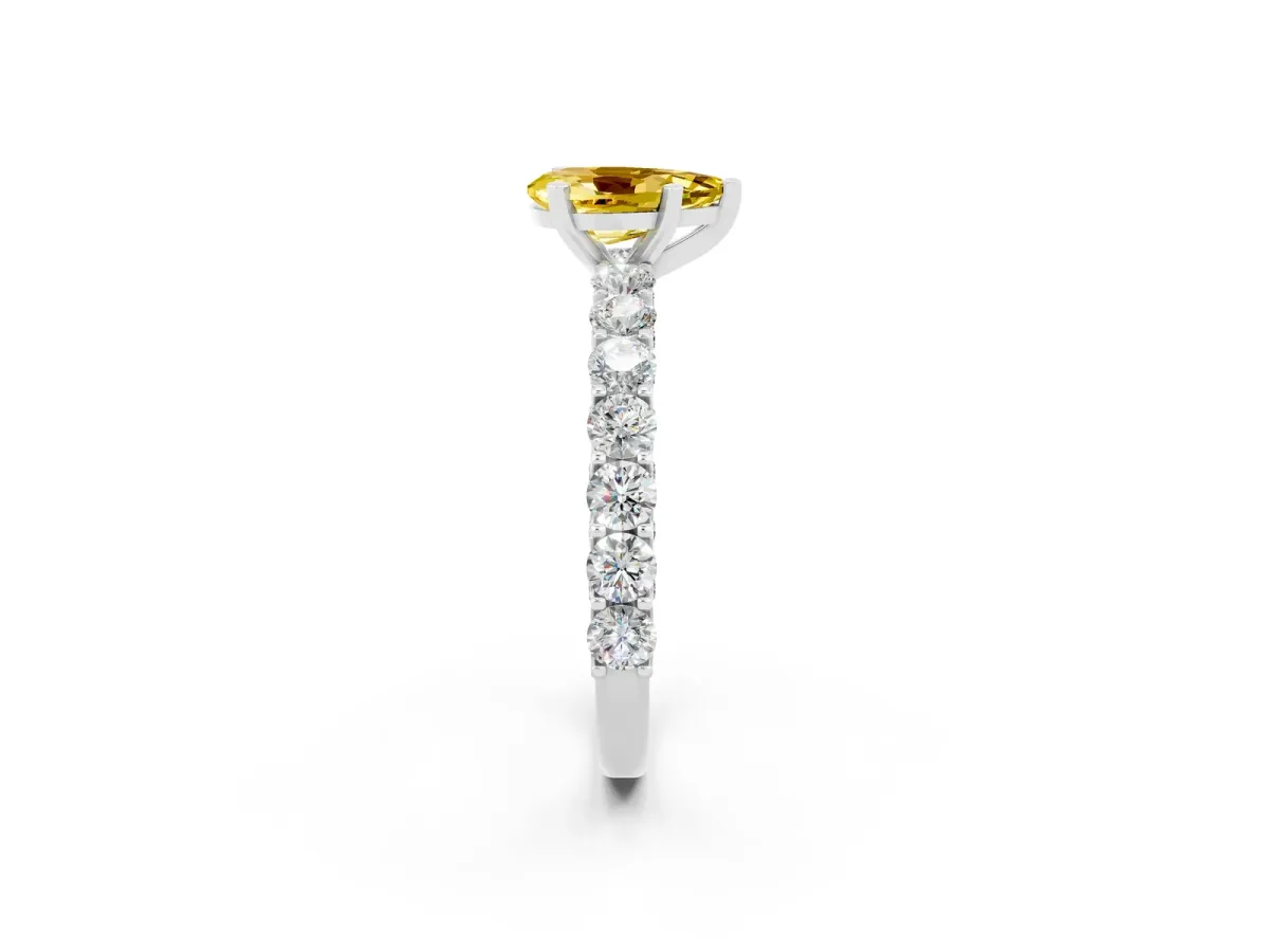 Pear Cut Yellow Sapphire Solitaire Ring with Shared Prong Pavé Band and Four-Prong Setting Silver