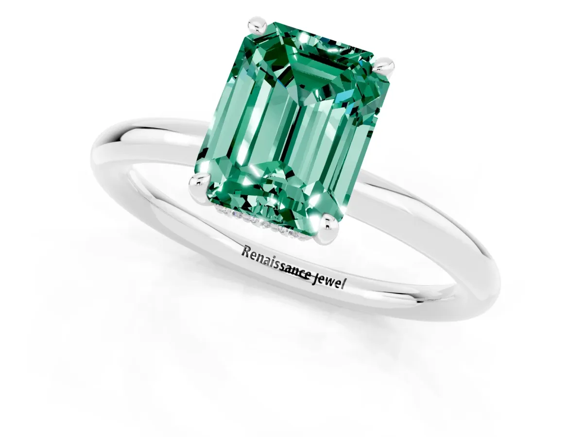 Emerald Cut Green Sapphire Solitaire Ring with Thin Band and Four-Prong Setting White gold
