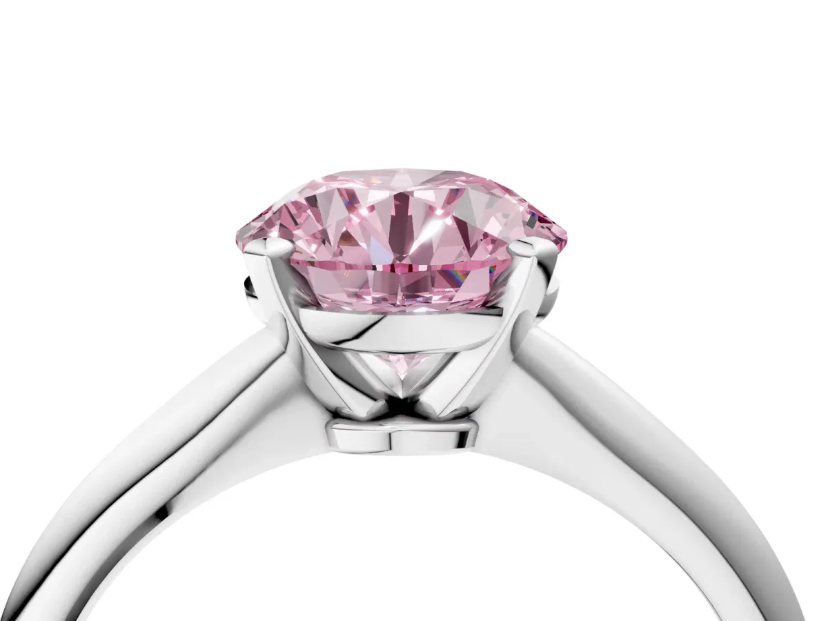 Fancy Pink Round Cut Diamond Solitaire Engagement Ring with Classic Band and Four-Prong Setting Silver