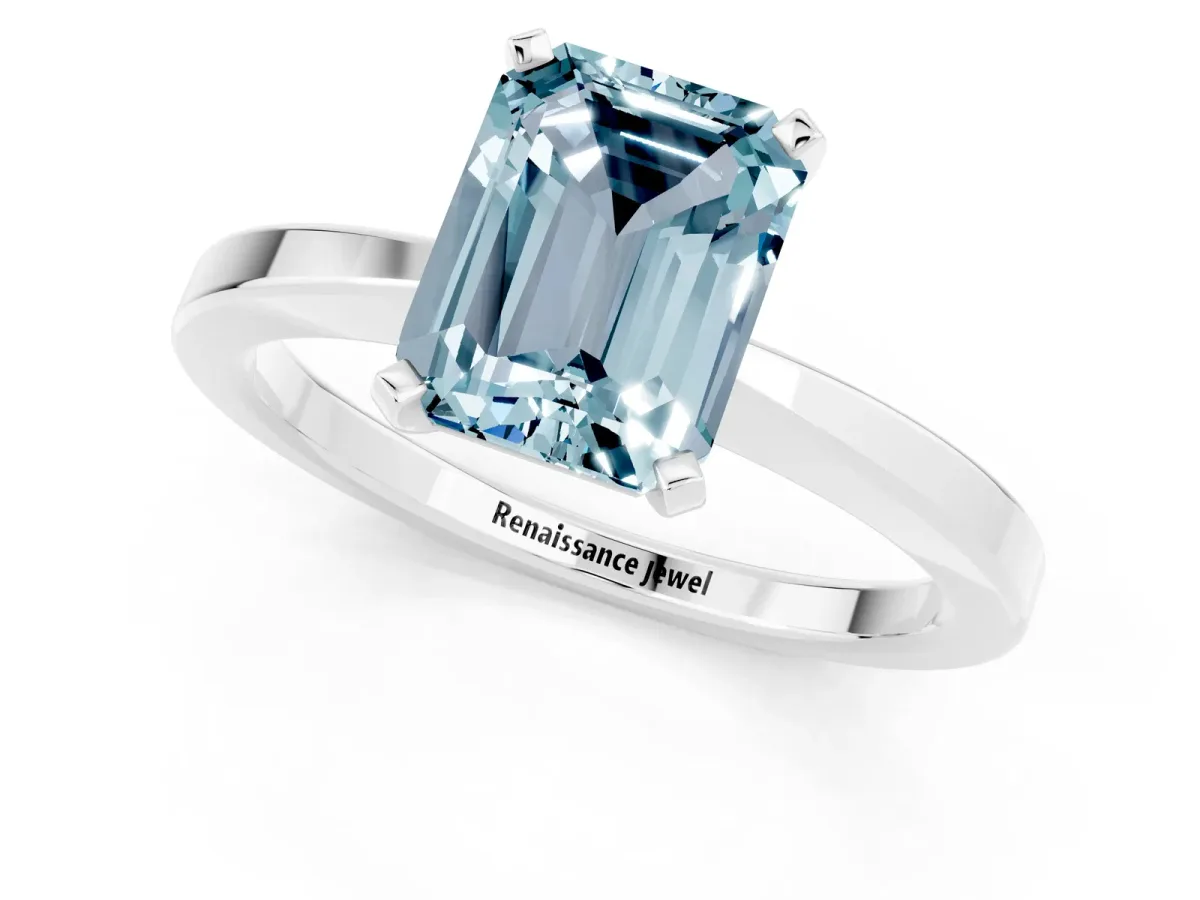 Emerald Cut Aquamarine Solitaire Engagement Ring with Classic Band and Four-Prong Setting Silver