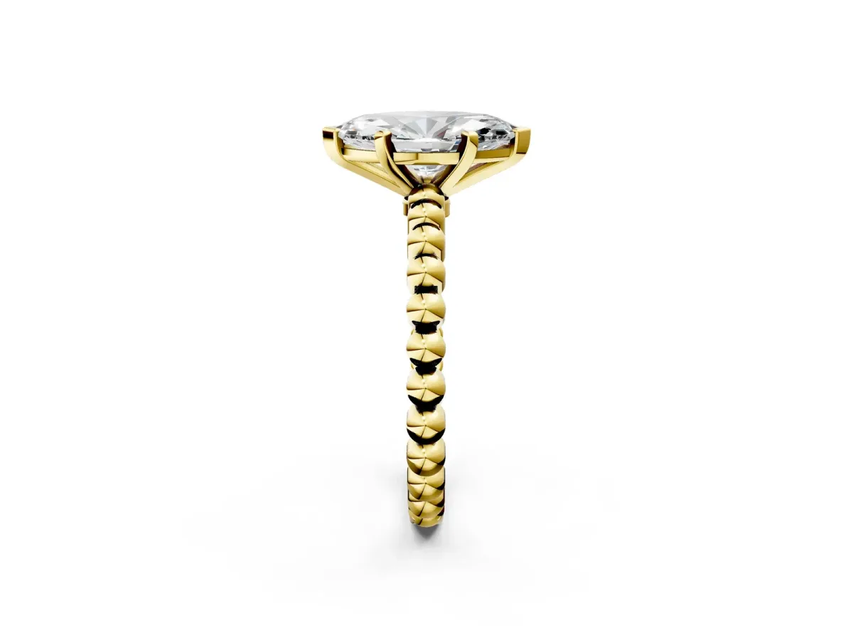 Marquise Cut Diamond Solitaire Ring with Beaded Band and Prong Setting Yellow gold