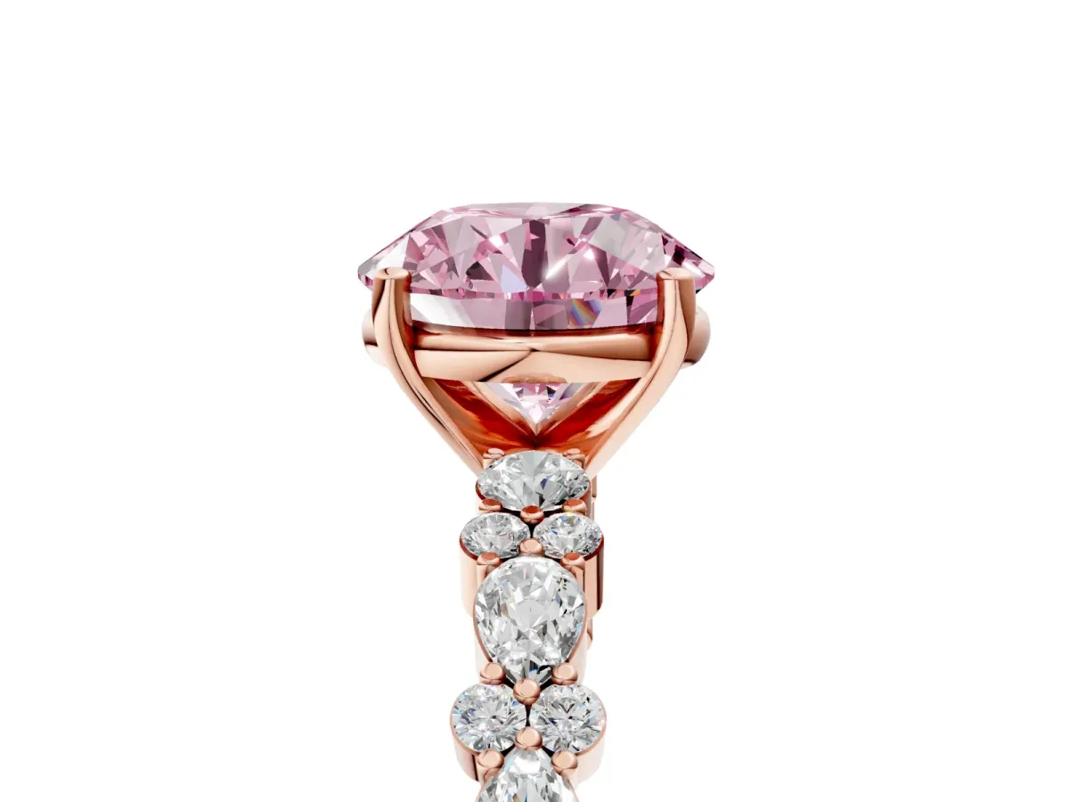 Fancy Pink Round Cut Diamond Side Stone Solitaire Ring with Round and Four-Prong Setting Rose gold