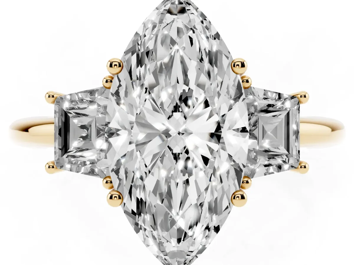 Marquise Cut Diamond Three-Stone Ring with Trapezoid Side Stones and Prong Setting Yellow gold