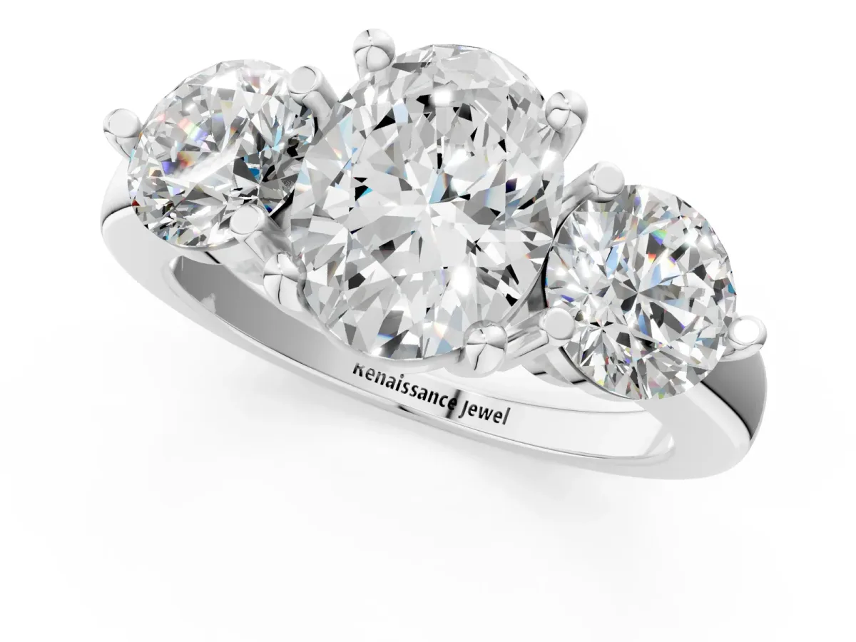 Three-Stone Oval Cut Brilliant Cut Solitaire Ring with Prong Setting on a Classic Band White gold