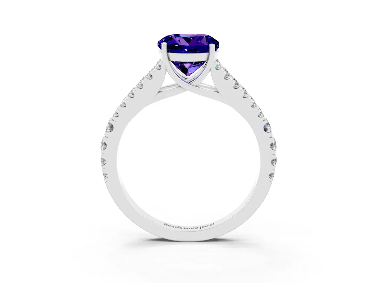 Round Cut Tanzanite Split Shank Engagement Ring with Round Pavé and Prong Setting Platinum