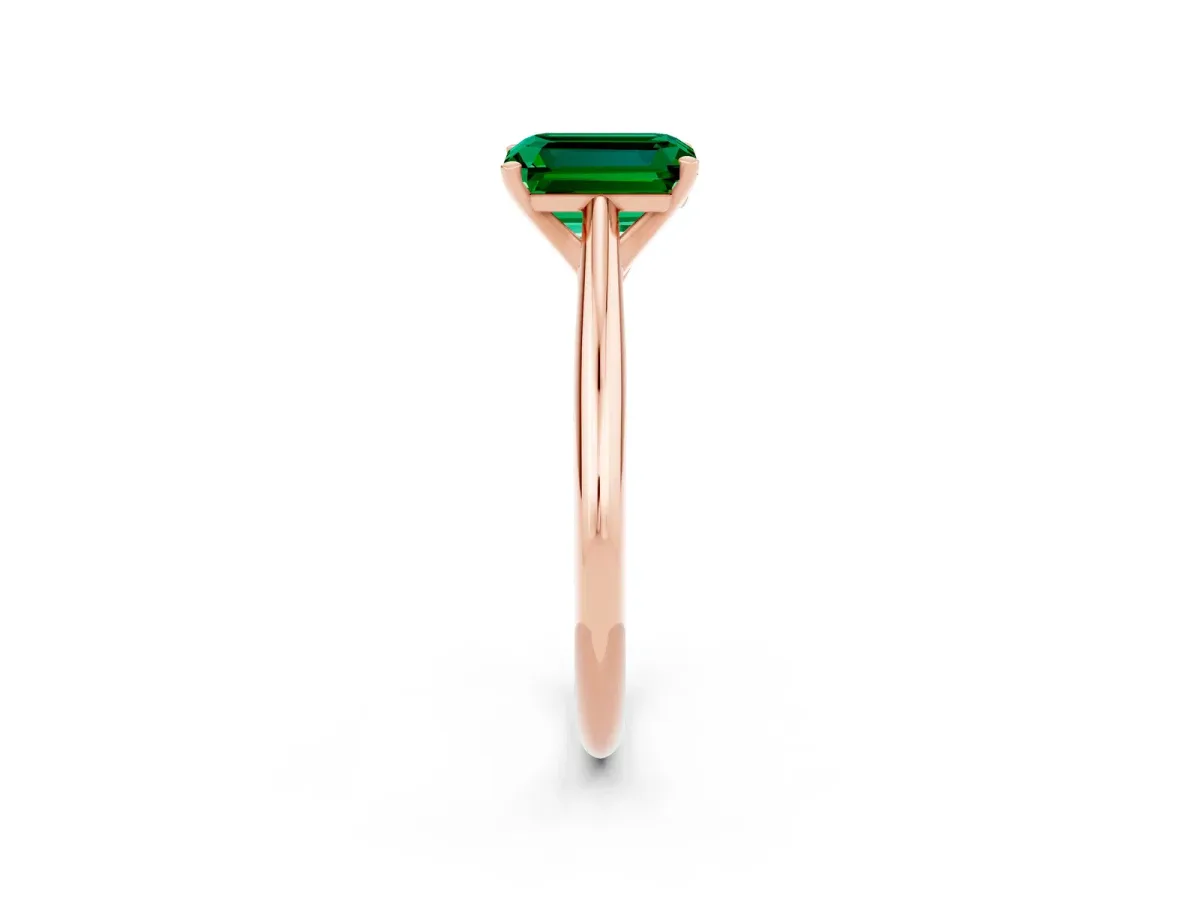 Emerald Cut Emerald Solitaire Engagement Ring with Cathedral Setting and Four-Prong Mount Rose gold