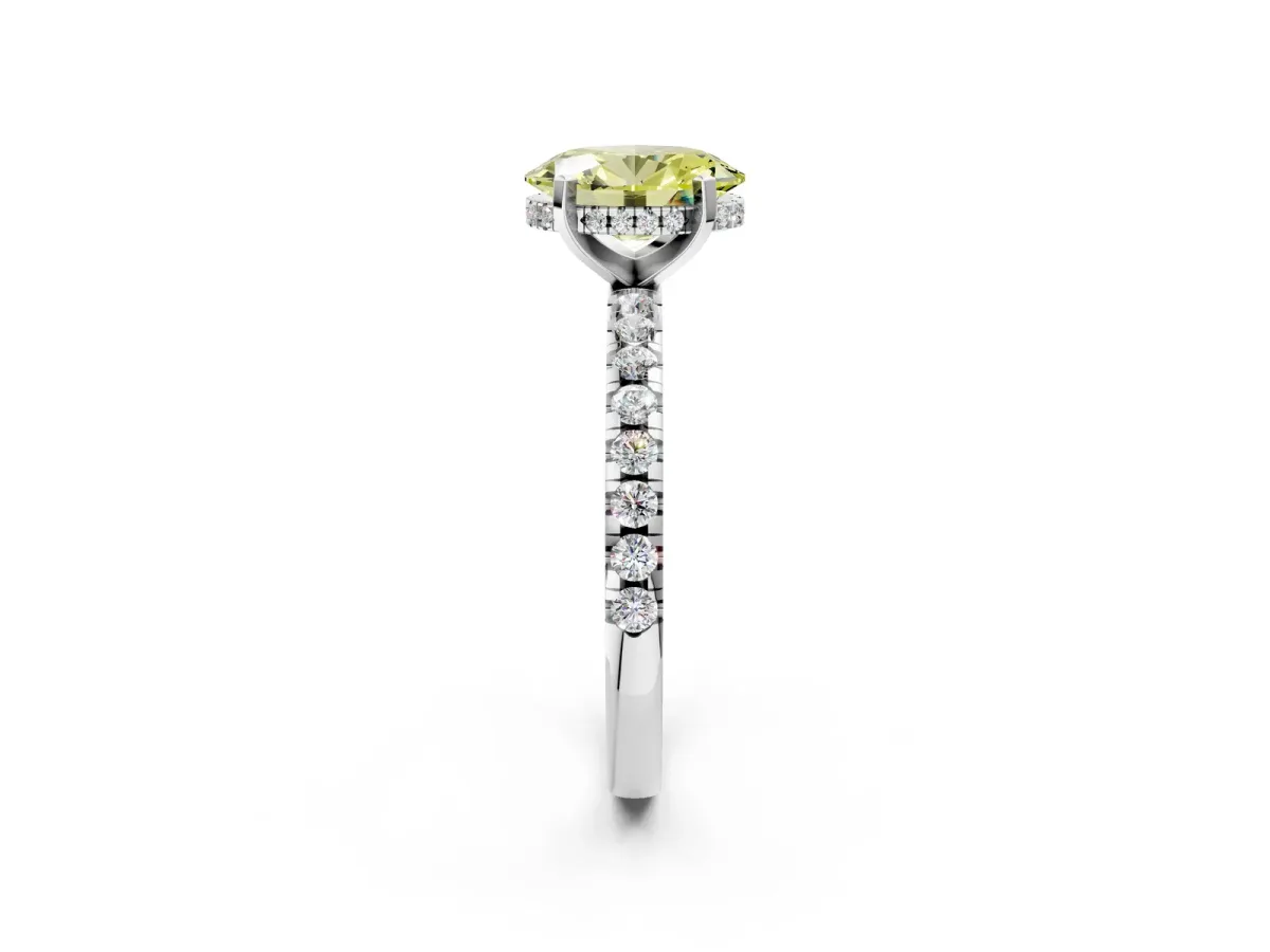 Fancy Yellow Oval Cut Diamond Solitaire Ring with Round Pavé Band and Four-Prong Setting Silver