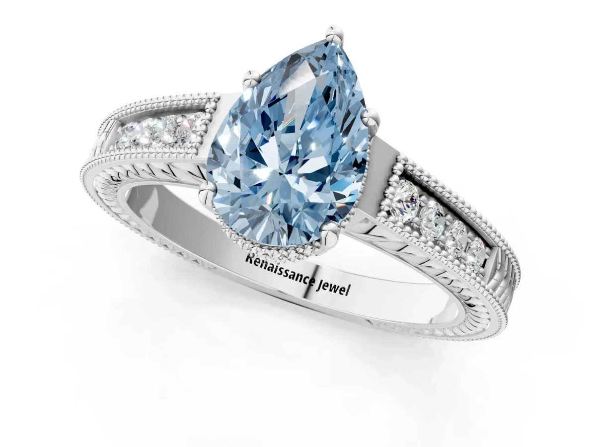 Fancy Blue Pear Cut Diamond Ring with Milgrain Pavé Band and Four-Prong Setting Platinum