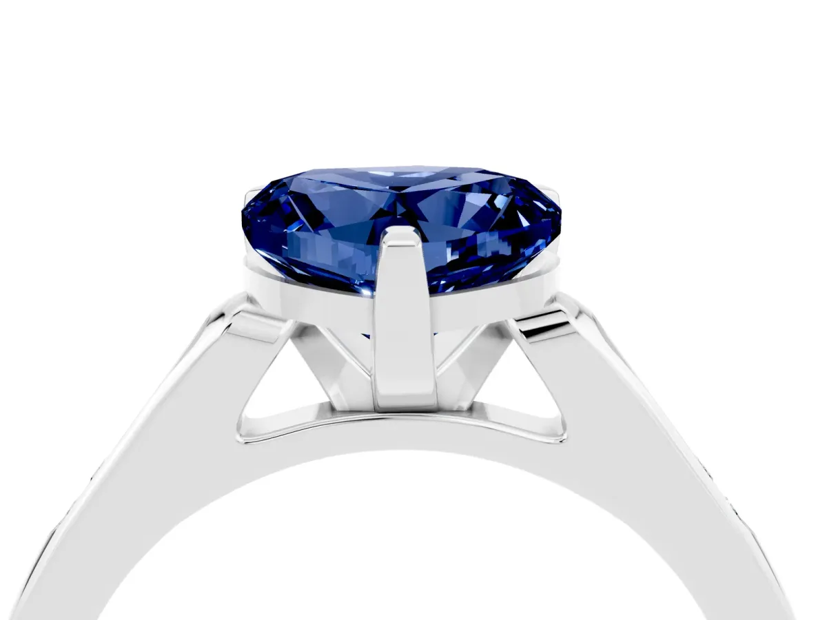Heart Cut Blue Sapphire Solitaire Ring with Channel Set Round Band and Prong Setting Silver