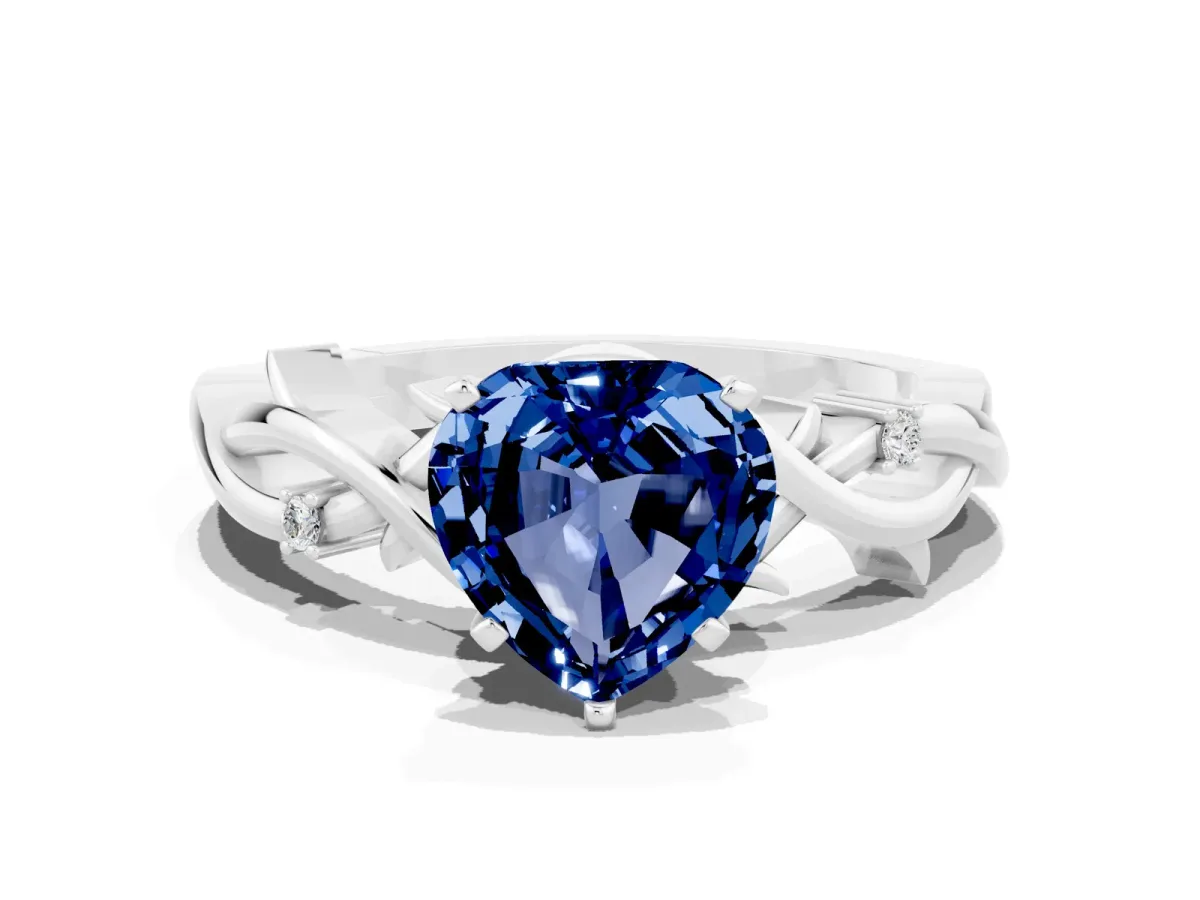 Heart Cut Blue Sapphire Solitaire Ring with Twisted Band and Prong Setting Silver