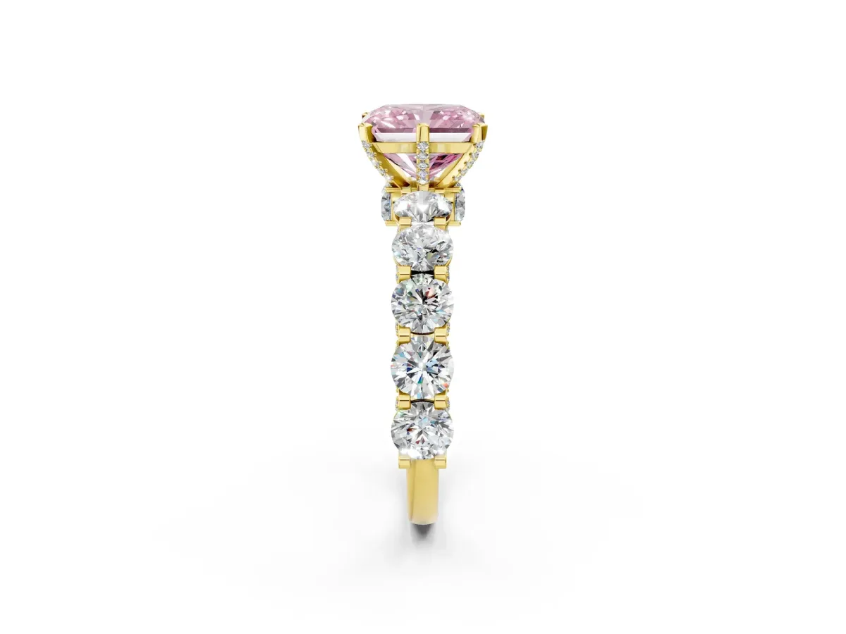 Fancy Pink Radiant Cut Diamond Side Stone Engagement Ring with Four-Prong Setting Yellow gold