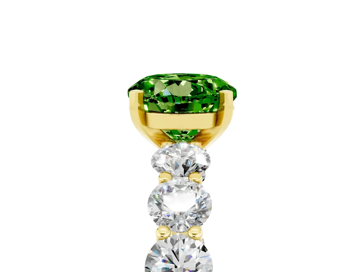 Round Cut Peridot Prong Setting with Side Stones on a Pave Band Yellow gold
