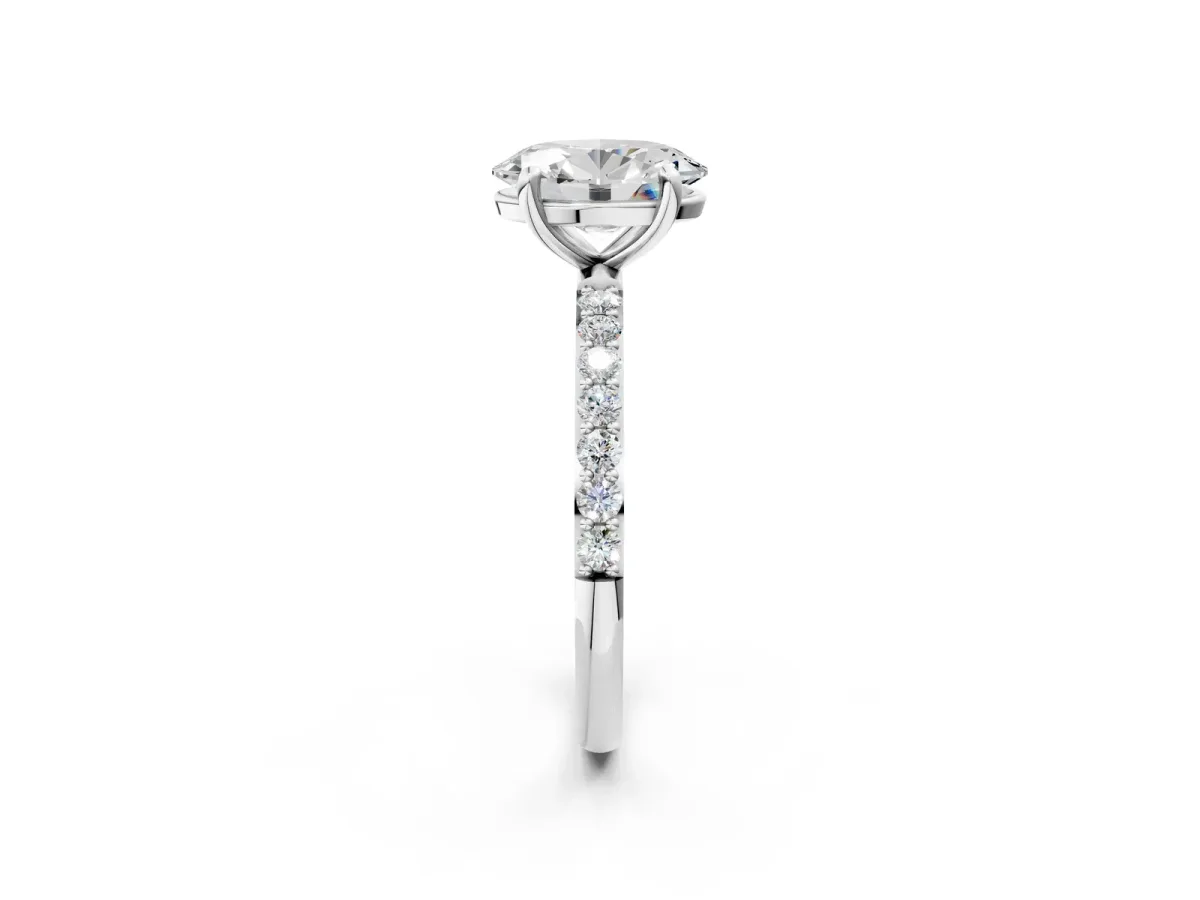 Oval Cut Diamond Solitaire Ring with Round Moissanite Pavé Band and Prong Setting Silver
