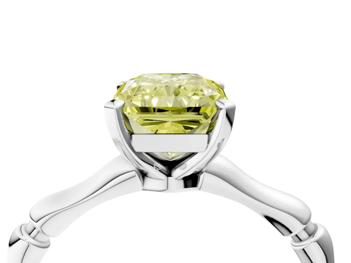 Fancy Yellow Radiant Cut Solitaire Diamond Ring with Bamboo Band and Four-Prong Setting Platinum