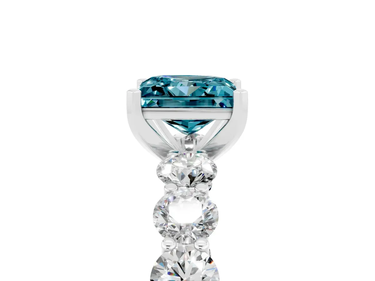 Princess Cut Blue Topaz Prong Setting with Side Stones on a Pave Band Silver