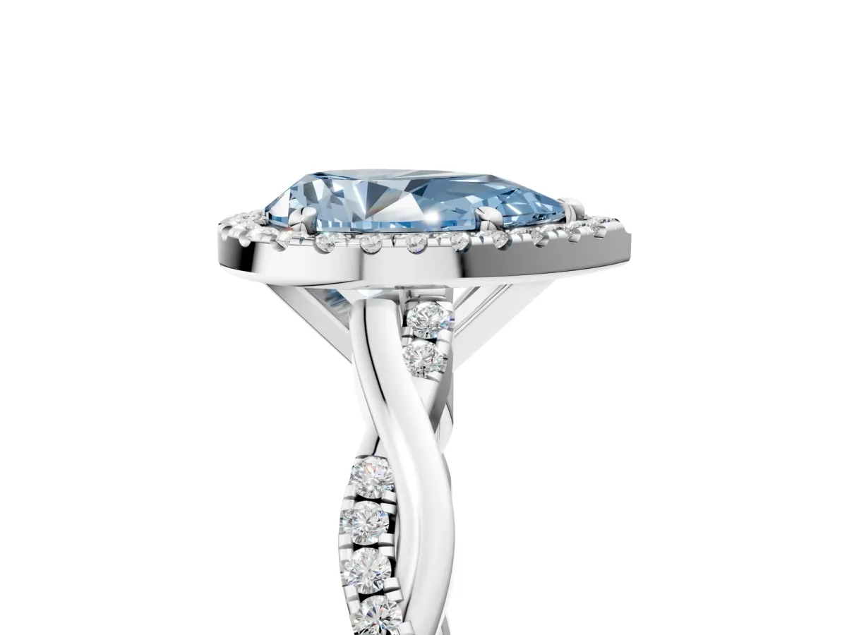 Fancy Blue Pear Cut Cut Halo Twisted Band Four-Prong Ring Platinum