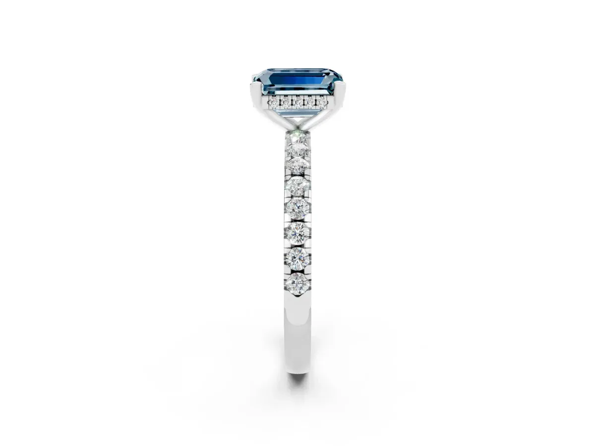 Emerald Cut Aquamarine Solitaire Ring with Round Pavé Band and Four-Prong Setting Silver