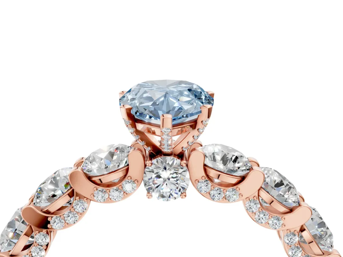 Fancy Blue Pear Cut Diamond Side Stone Engagement Ring with Four-Prong Setting Rose gold