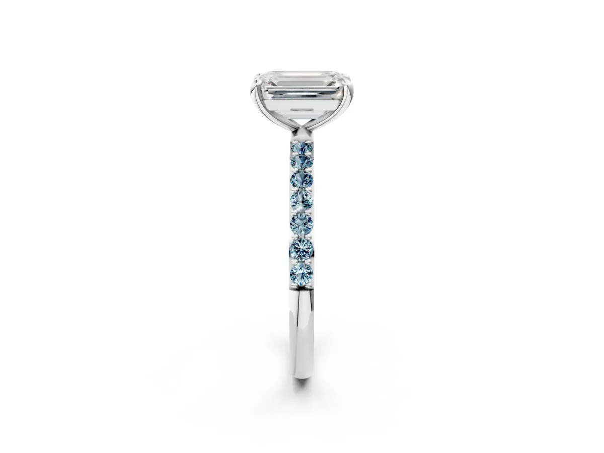 Emerald Cut Diamond Solitaire Ring with Round Aquamarine Pavé Band and Prong Setting Silver